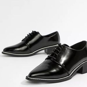 Pointed lace up dress shoes